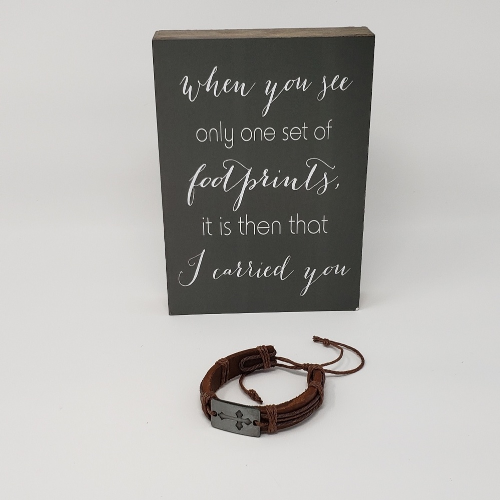 Leather adjustable bracelet with silver cross.✝️